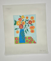 Orange/Red Flowers in Vase