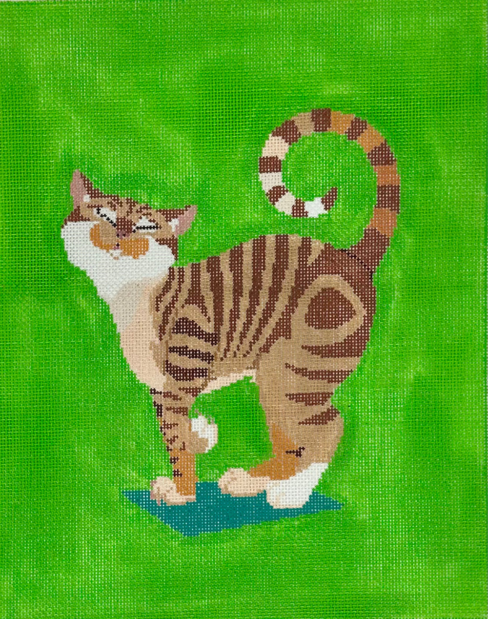 Striped Cat on Green