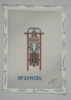 Sled with Blue Nutcracker
