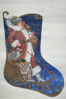Mrs. Santa Sleds In Stocking
