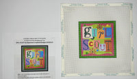 Girl Scout with stitch guide
