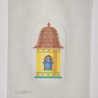 Yellow Birdhouse with Blue Bird