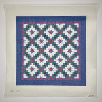 Quilted Pattern on Blue Border
