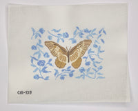 Tan Butterfly on Blue Background
